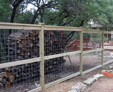 Cattle panels with wood frames making a solid ranch cattle fencing